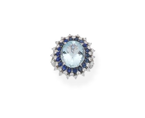 Aquamarine, sapphire and diamond cluster ringThe oval-cut aquamarine within a surround of pear-shaped sapphires and brilliant
