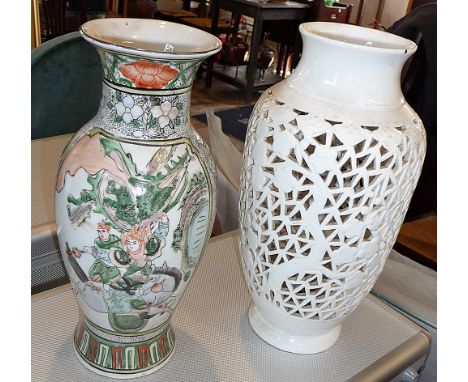 Chinese porcelain Famille Vert vase with a blanc de chine vase (both drilled as lamp bases)