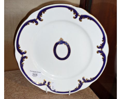 A Minton armorial dinner plate from Buckingham Palace made for Goodes &amp; Co. Purveyors for Royalty