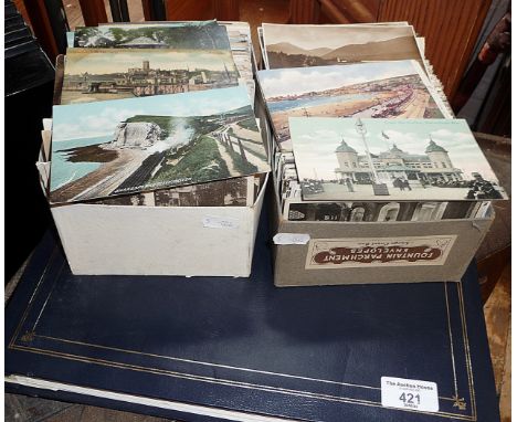 Album containing old postcards of local Dorset and Devon towns and villages, inc. Lyme Regis, Charmouth, Budleigh Salterton a