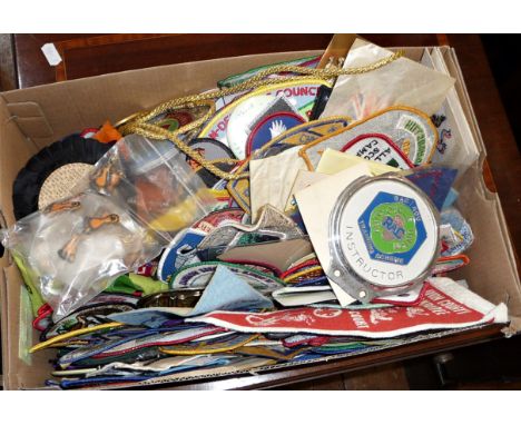Large quantity of vintage embroidered badges, some boy scout related, car badges, etc.