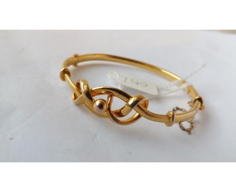 9ct. knot hinged bangle 5.8g.      
