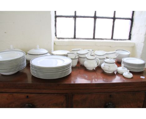 A selection of Royal Doulton Ravenswood pattern tableware including two tureens, cups, saucers, plates, bowl, milk jug and su