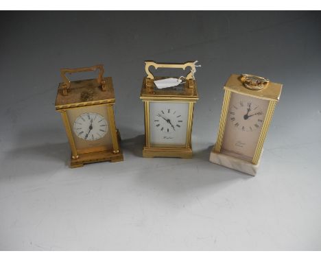 A group of five assorted clocks to including Kleninger wooden cased mantel clock, oak clock with barley twist supports and th