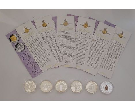 Six Elizabeth II "Golden Jubilee Collection" silver proof commemorative coins, with the Queens portrait highlighted in 22ct. 