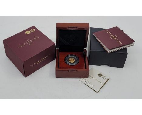 An Elizabeth II 2017 quarter-sovereign gold coin, obverse portrait Jody Clark, rev, St.George surrounded by inscription 'Honi