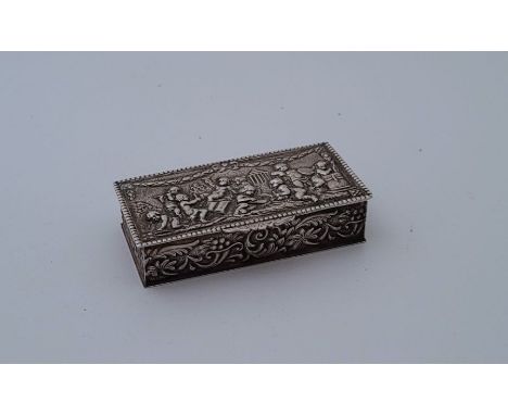 A 19th century white metal rectangular snuff box,&nbsp;the hinged lid repousse and chased scene of cherubs within a formal ga