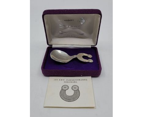 An Irish Celtic silver caddy spoon, by Thomas O'Connor &amp; Sons Ltd, Dublin 1973, also stamped 1973 E.E.C. commemorative ha