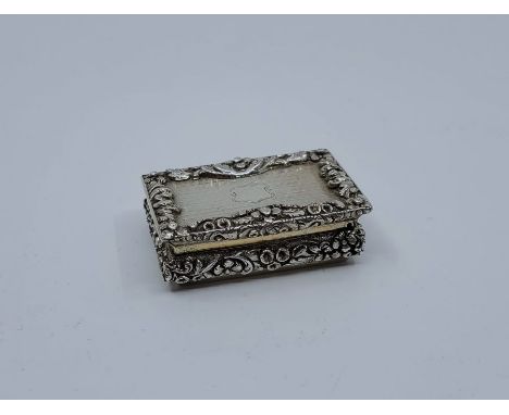 A Victorian silver vinaigrette, by Nathaniel Mills, Birmingham 1839, the top and base engine turned with floral border, the s