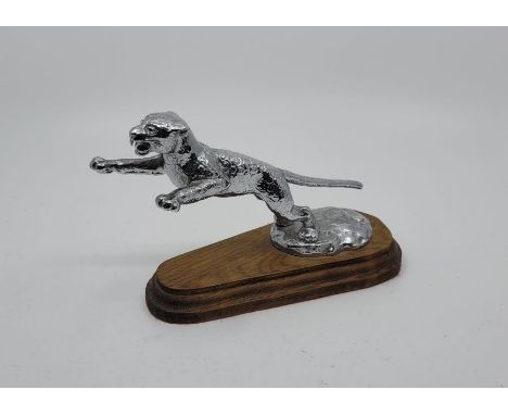 An SS Jaguar car mascot, by Desmo, c.1938, being an approved optional extra mascot designed by F Gordon Crosby, stamped "Desm