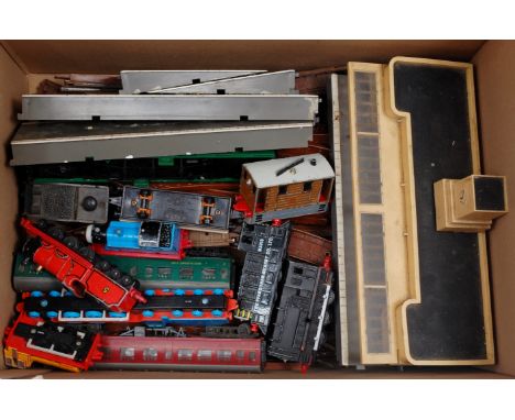A quantity of Triang TT track, coaches and a country station (F-G), and 7 ERTL push-along Thomas the Tank Engine locomotives 