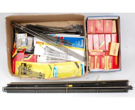 A large quantity of mainly Peco Streamline track, some Hornby and Lima, much of it unused, including 30+ points in original p