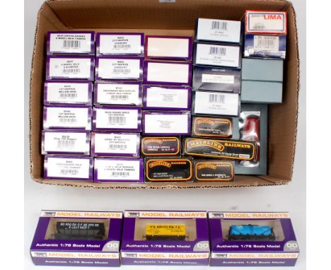 A large tray containing 19x Dapol including 4x limited editions, 4x Bachmann, 5x Mainline, 2x Lima and 3x Hornby Wagons - tot