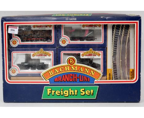 A Bachmann rare London Transport freight set with 0-6-0PT No. L91 in maroon, two open wagons and brake van, track and power c