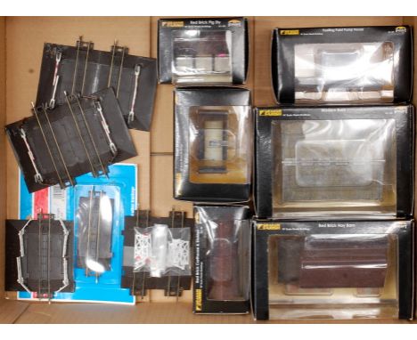 6 boxed N gauge buildings by Graham Farish Scalescene (G,BG) 4 assembled Peco level crossings (G), and an unopened single tra