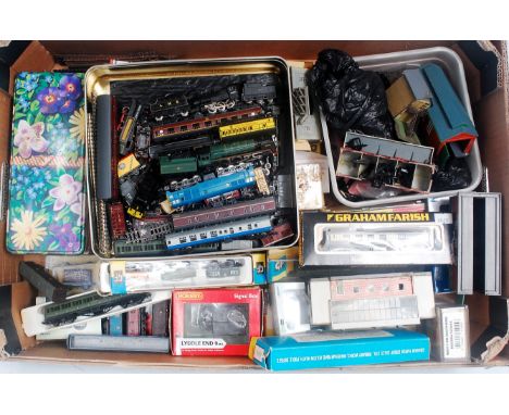 An extensive collection of loose and boxed N gauge locomotives, rolling stock and accessories, mixed examples by Graham Faris
