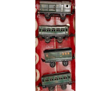 Tray containing 4x Marklin green coaches including 2x No. 6789 brake/baggage car with sliding door No. 17260 and postal van N