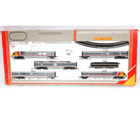 A Hornby R543 Advanced Passenger Train set with power and trailer cars, 3 centre cars, track but no power controller, pantogr