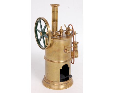 Freelance design spirit fired vertical steam engine, constructed from brass and copper components, comprising of single oscil