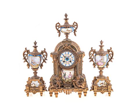 A FRENCH GILT-BRASS AND PAINTED PORCELAIN CLOCK GARNITURE, 19TH CENTURY the 9cm circular painted dial with Roman hour numeral