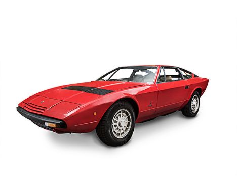 A 1973 MASERATI KHAMSIN Colour: red with cream leather upholstery. Left hand drive, not currently licensed.  Chassis: 012. An