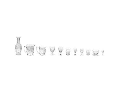 A PART SUITE OF WATERFORD CRYSTAL 'COLLEEN' PATTERN DRINKING GLASSES, 20TH CENTURY each cut with a band of lozenges above a b