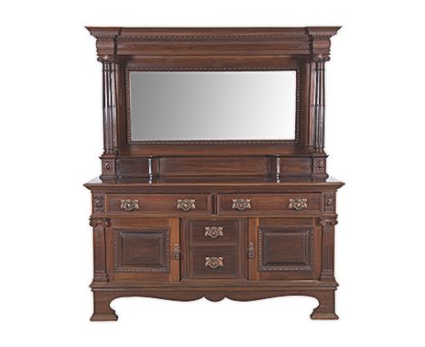 A MAHOGANY MIRROR-BACKED SIDE BOARD, LATE 19TH/EARLY 20TH CENTURY the moulded rectangular top surmounted by a rectangular bev