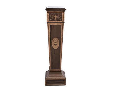 AN EDWARDIAN MAHOGANY AND INLAID PEDESTAL the rectangular crossbanded top above a frieze inlaid with an urn, swags and bellfl