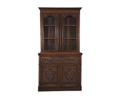 A MAHOGANY BUREAU BOOKCASE, LATE 19TH/EARLY 20TH CENTURY the moulded outswept cornice above a pair of acanthus-leaf carved an