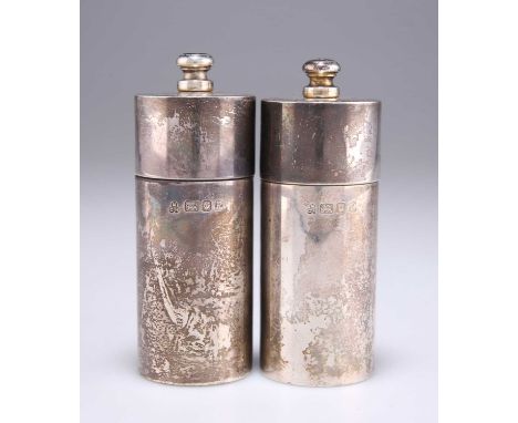 A PAIR OF ELIZABETH II SILVER PEPPER GRINDERS by M C Hersey &amp; Son Ltd, London 1991, plain cylindrical. (2) 10.2cm high, 9