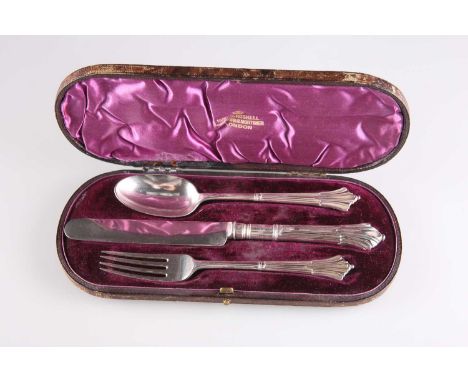 A VICTORIAN SILVER CHRISTENING SET by Francis Higgins III, 1883 and 1885, Albany pattern, comprising knife, fork and spoon, i