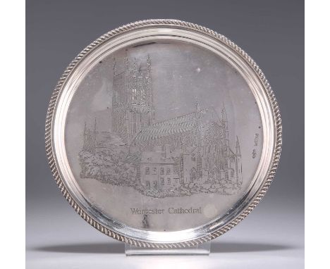 AN ELIZABETH II SILVER WAITER by Joseph Gloster Ltd, Birmingham 1975, circular, with a gadrooned rim, engraved with an image 