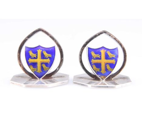 A PAIR OF EDWARDIAN SILVER AND ENAMEL UNIVERSITY COLLEGE OXFORD MENU HOLDERS by John William Barrett, Birmingham 1906, to oct