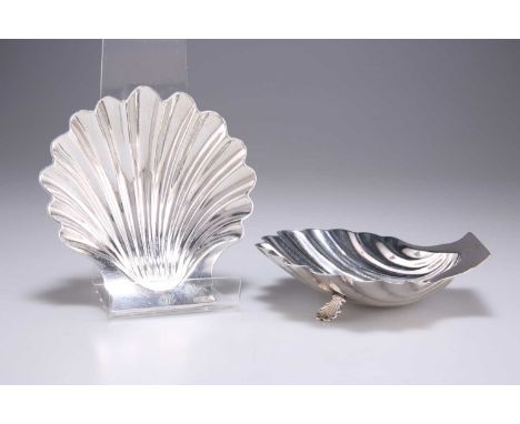 A PAIR OF GEORGE III SILVER BUTTER DISHES by John Romer, London 1765, of shell form, with shell-form feet, each engraved with