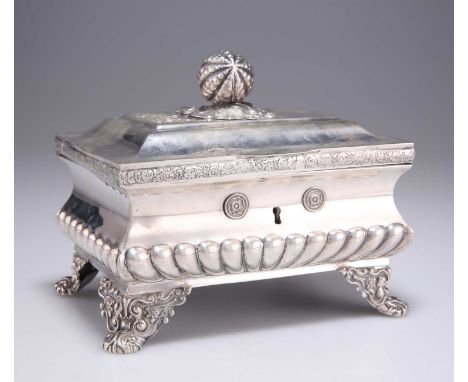 A MID-19TH CENTURY GERMAN SILVER TEA CADDY by Friedlaender &amp; Corp, Berlin, of casket form with a decorative foliate scrol