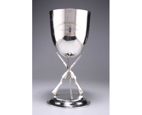 A LARGE EDWARDIAN SILVER 'RIFLE' TROPHY CUP by Charles Boyton &amp; Son Ltd, London 1906, the ovoid bowl engraved TUNBRIDGE W