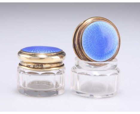 A PAIR OF GEORGE V SILVER AND BLUE ENAMEL JARS by Turner & Simpson Ltd, Birmingham 1926, each with a circular top and panelle