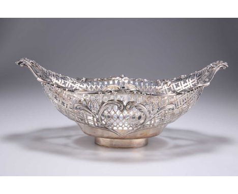 A GEORGE III PIERCED SILVER BASKET by Emick Romer, London 1770, from an epergne, the applied rim of crisply cast and chased r