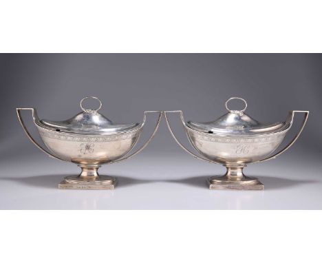 A PAIR OF GEORGE III SILVER SAUCE TUREENS AND COVERS by Paul Storr, London 1798, boat-shaped with twin handles and pedestal f