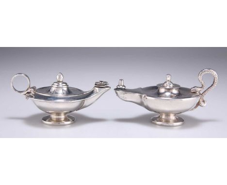 † TWO VICTORIAN SILVER TABLE LIGHTERS the first Irish, by West &amp; Son, Dublin 1882, modelled as a Roman lamp, the shallow 