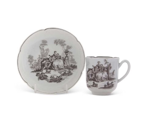 An 18th Century Worcester porcelain teacup and saucer of unusual petal shape rims, printed with L'Amour, the saucer signed R 