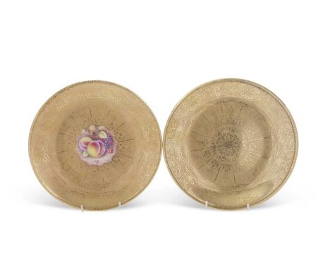 A further Royal Worcester gilt decorated plate, the centre painted with fruit, signed by T Nutt, Royal Worcester factory mark