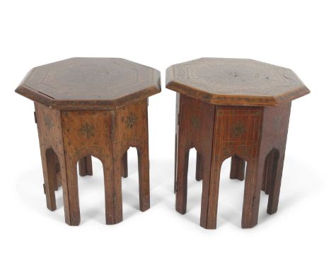 A Pair of small Indian hardwood and brass inlaid Hoshiarpur octagonal lamp tables with folding bases, 31cm high