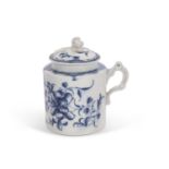 An 18th Century Worcester mustard pot and cover with floral design