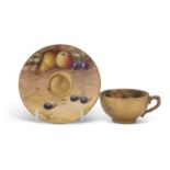 A miniature Worcester porcelain cup and saucer painted with fruit, the saucer signed R Harper and