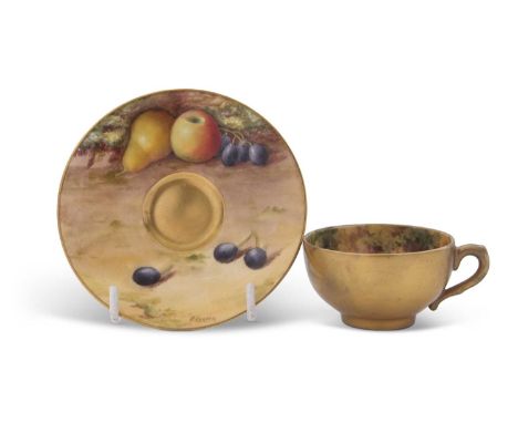 A miniature Worcester porcelain cup and saucer painted with fruit, the saucer signed R Harper and the cup signed by Price (re