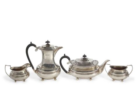 A four-piece silver tea and coffee service of oval form comprising coffee pot, Sheffield 1925, teapot and milk jug, Sheffield