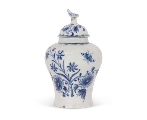 A rare Lowestoft porcelain vase and cover with bird finial, the vase of baluster form painted with floral sprays and bugs, th