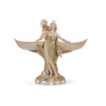 An impressive Royal Dux Art Nouveau centrepiece modelled as two maidens surrounding a central stem