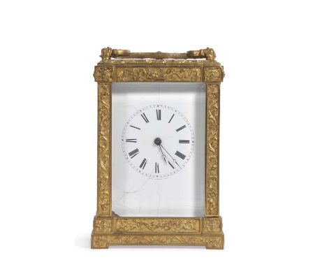 A 19th Century French carriage clock with white enamel dial, a brass framed case with scrolled decoration, brass movement str